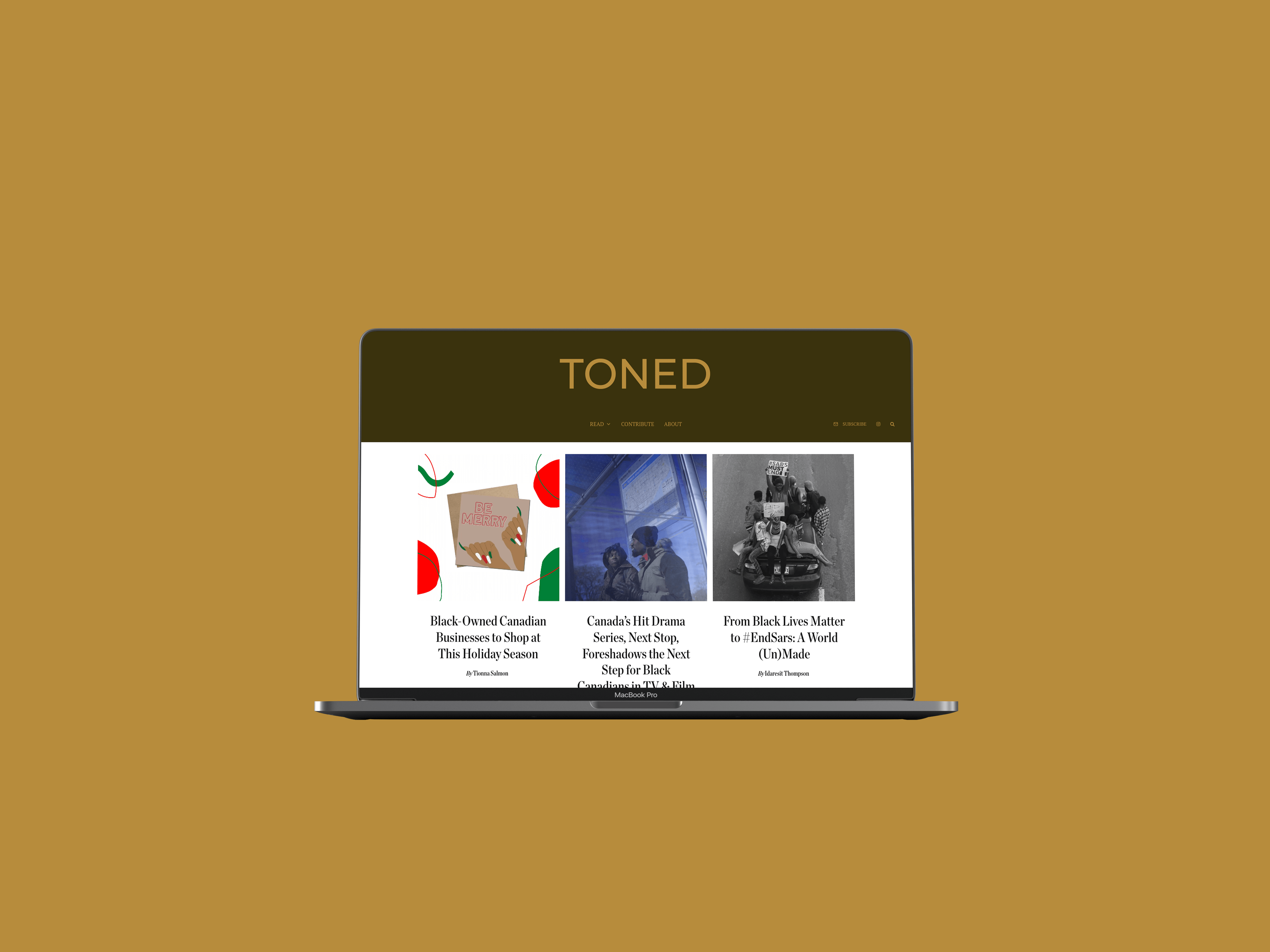 Toned Magazine website homepage on desktop macbook